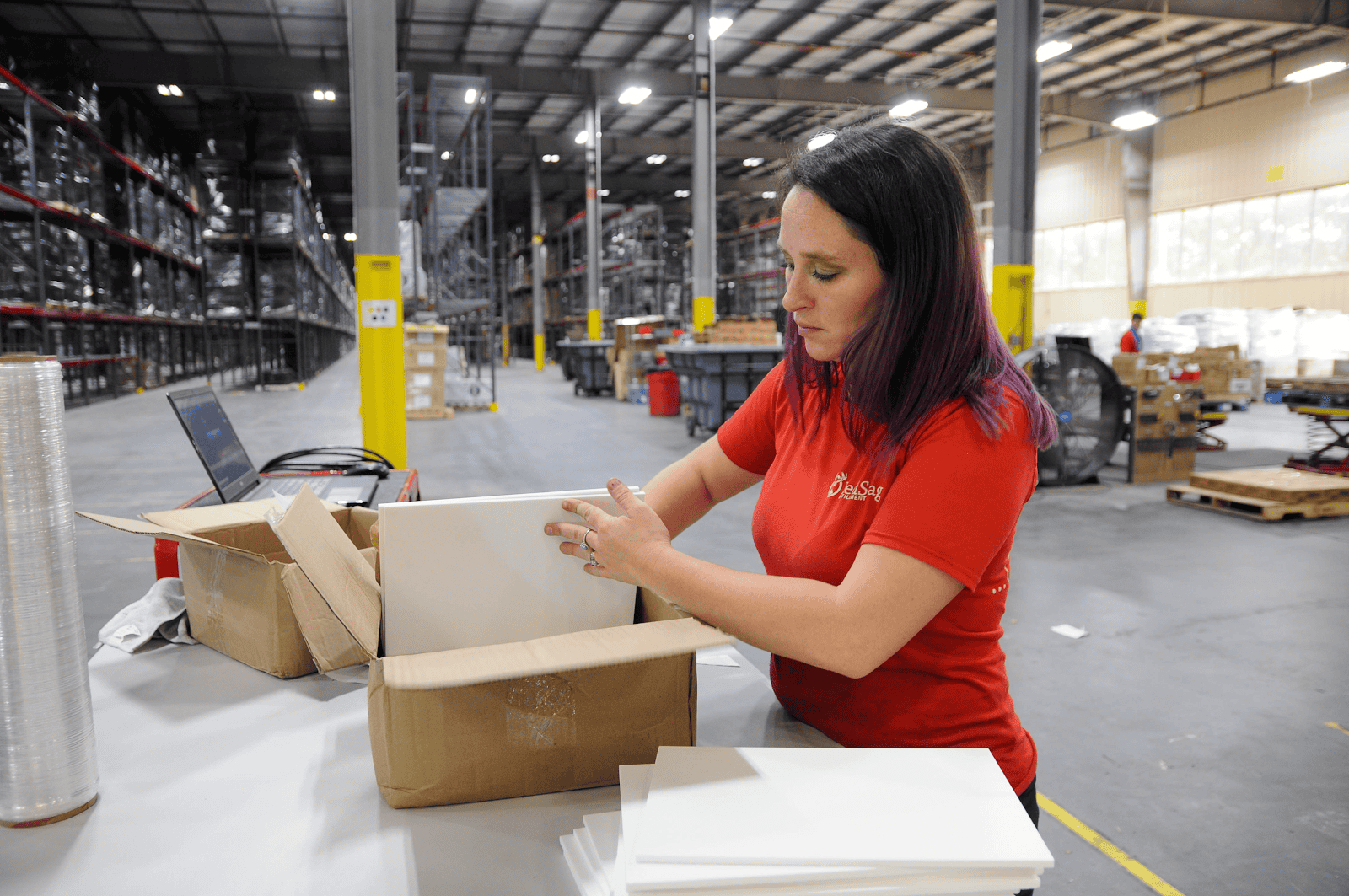 Red Stag Fulfillment employee packing Red Stag Fulfillment employee packing