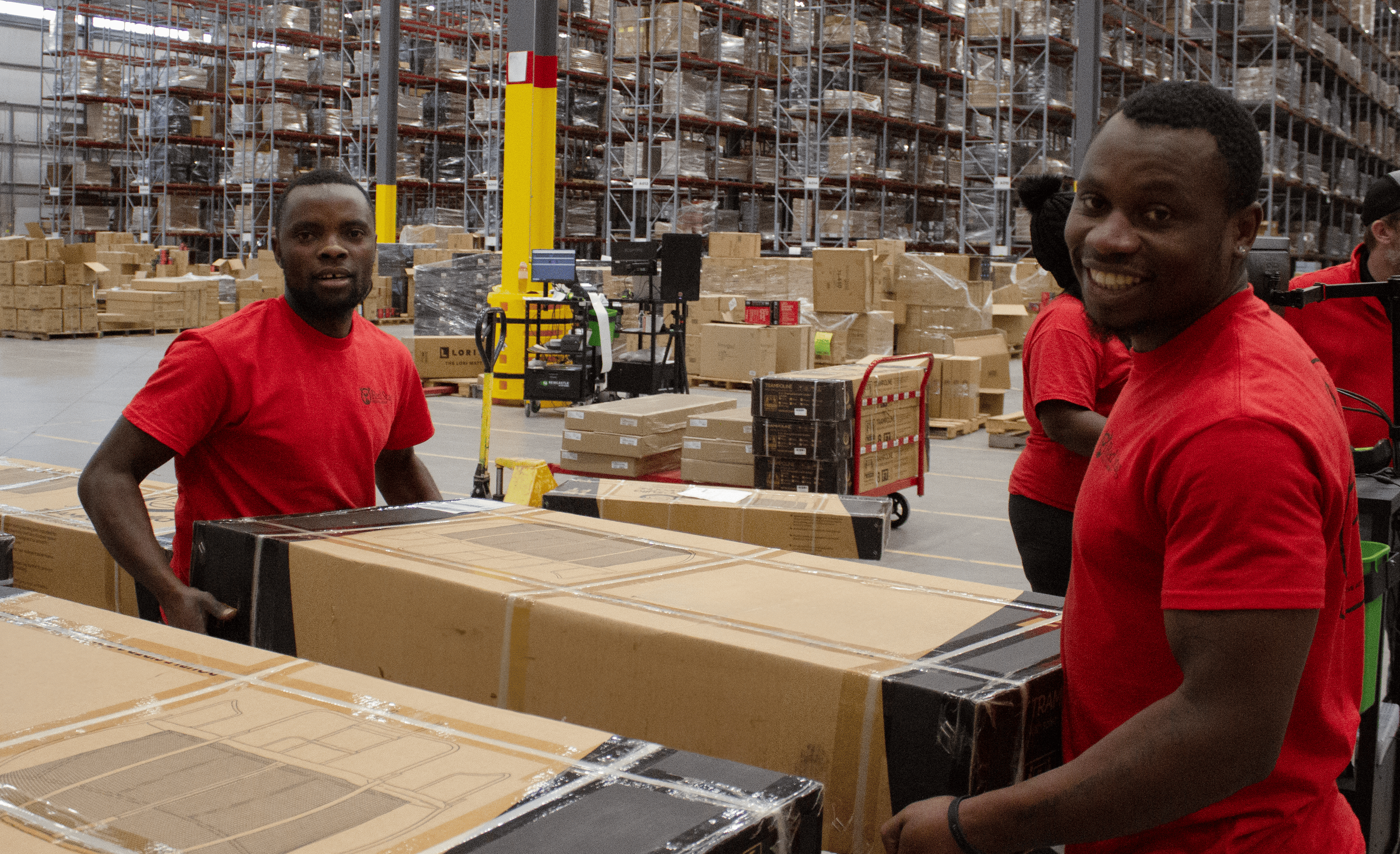 Red Stag Employees Handling Large Item Red Stag Employees Handling Large Item
