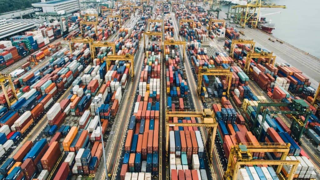 containers at port slowed down, representing impact on the business operations of eCommerce