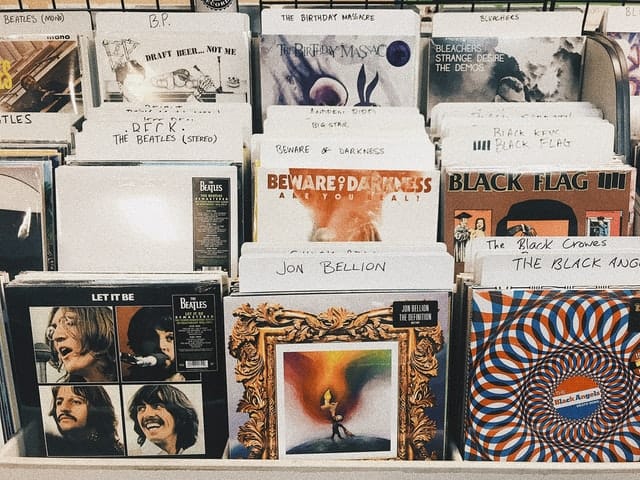 A collection of CDs and records that would need safe media fulfillment