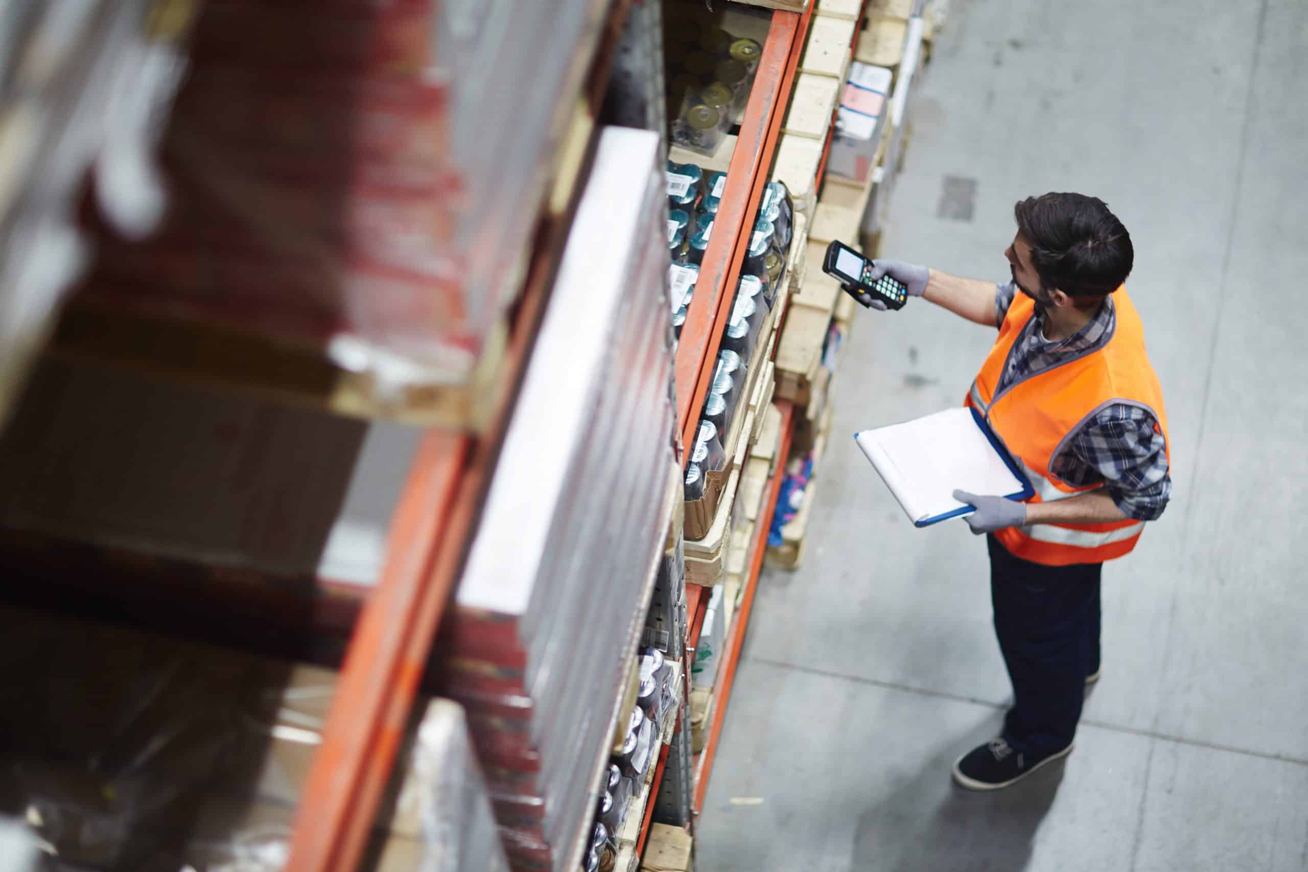 warehouse worker checking inventory warehouse worker checking inventory